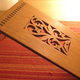 Illustration for article titled Boost Your iPads Ego With This Laser Cut Cherry Wood Stand